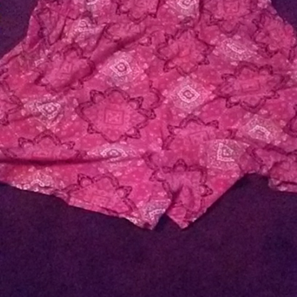 Red print off the shoulder jumper. - Picture 2 of 7